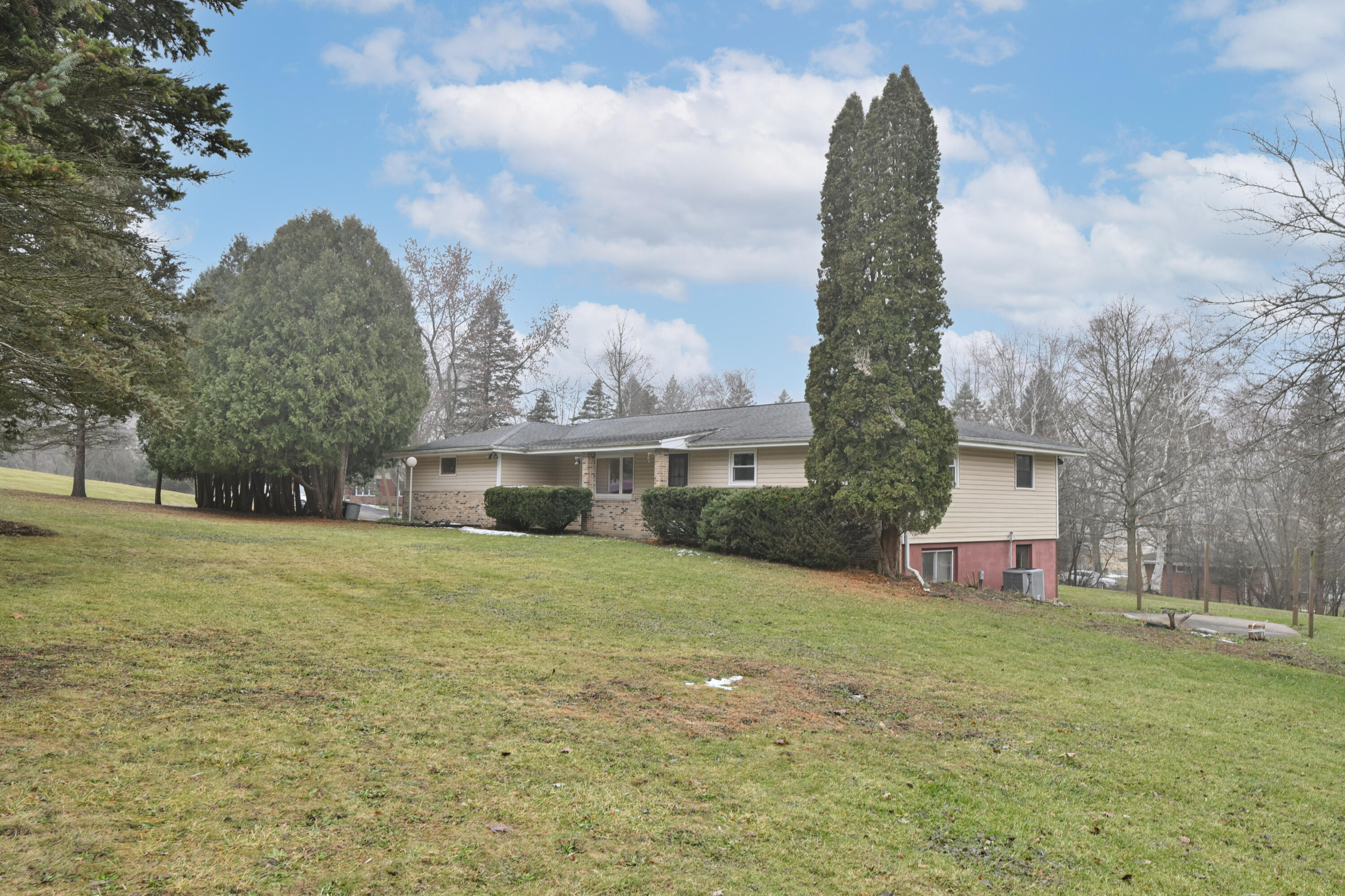 N5907 Aspen Drive Spring Prairie, WI 53105 - Photo 6 of 51 Side View of Home