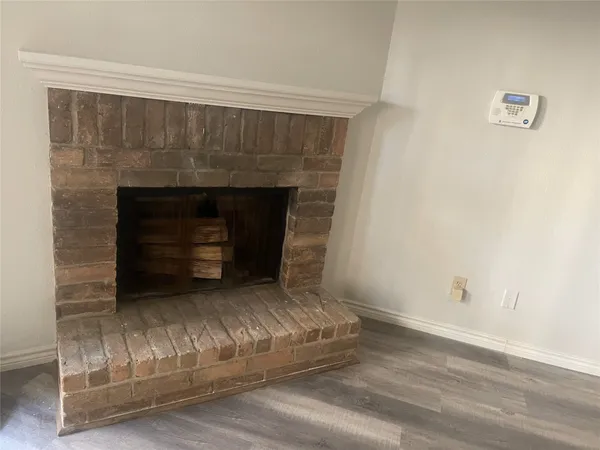 a living room with a fireplace