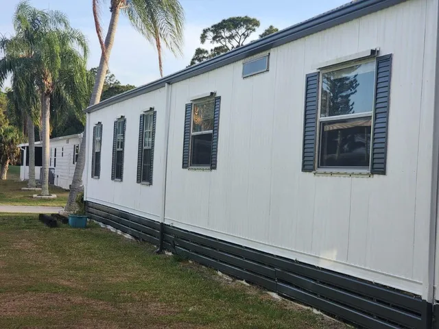 a house with trees in front of it