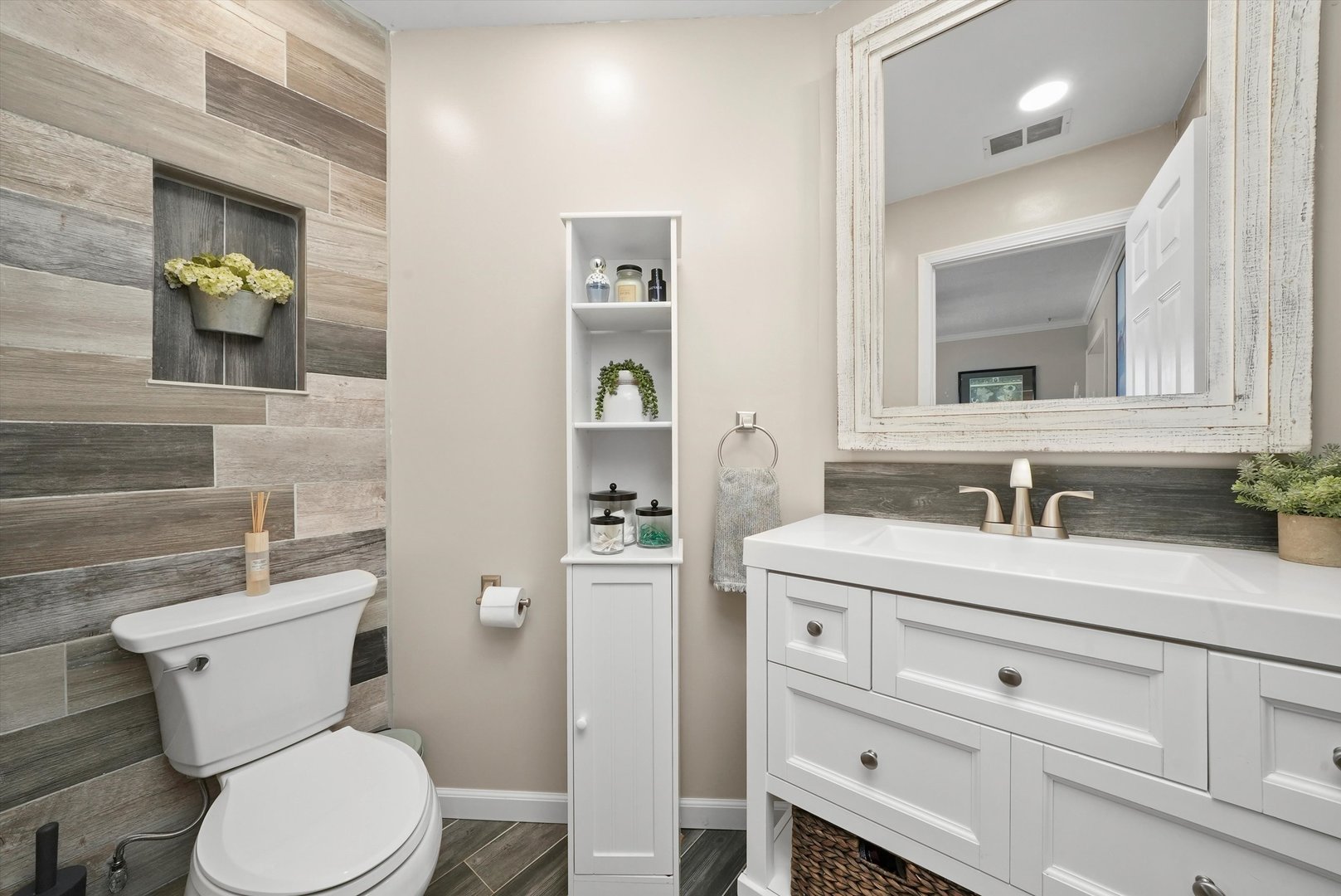 3908 Owl Drive Rolling Meadows, IL 60008 - Photo 16 of 36 a bathroom with a granite countertop toilet sink and mirror