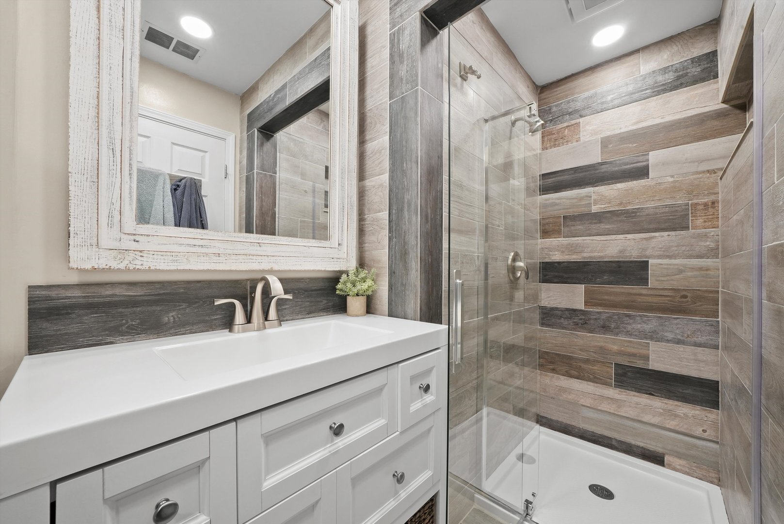 3908 Owl Drive Rolling Meadows, IL 60008 - Photo 17 of 36 a bathroom with a sink a vanity and a mirror
