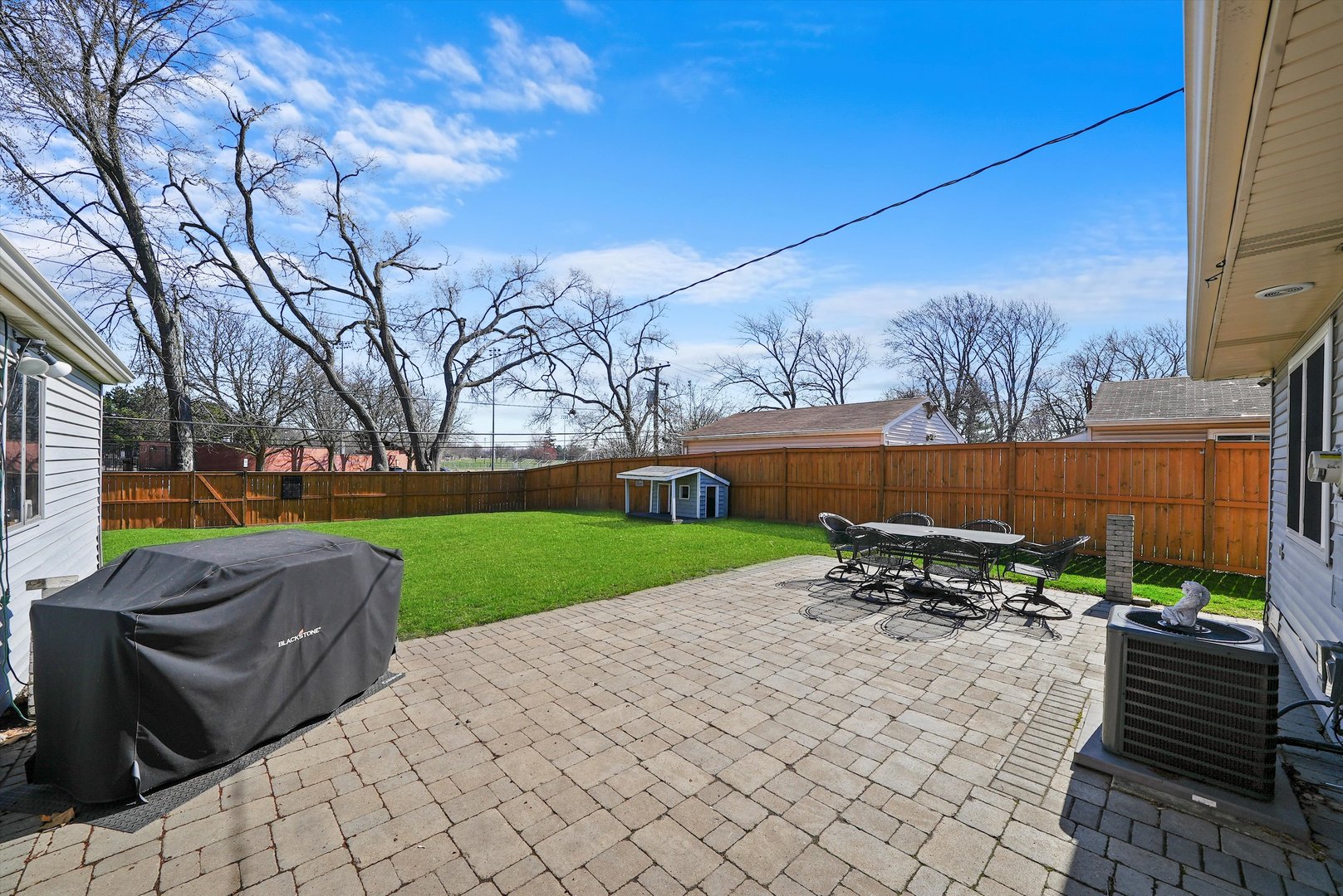3908 Owl Drive Rolling Meadows, IL 60008 - Photo 26 of 36 a view of a backyard with sitting area