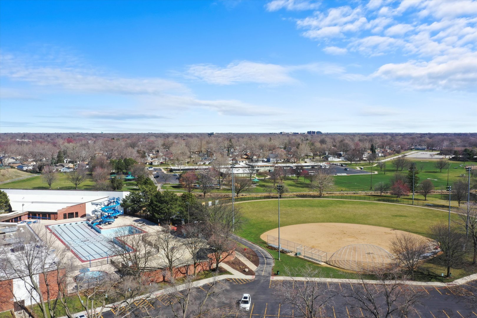 3908 Owl Drive Rolling Meadows, IL 60008 - Photo 33 of 36 an aerial view of a house with a garden and lake view