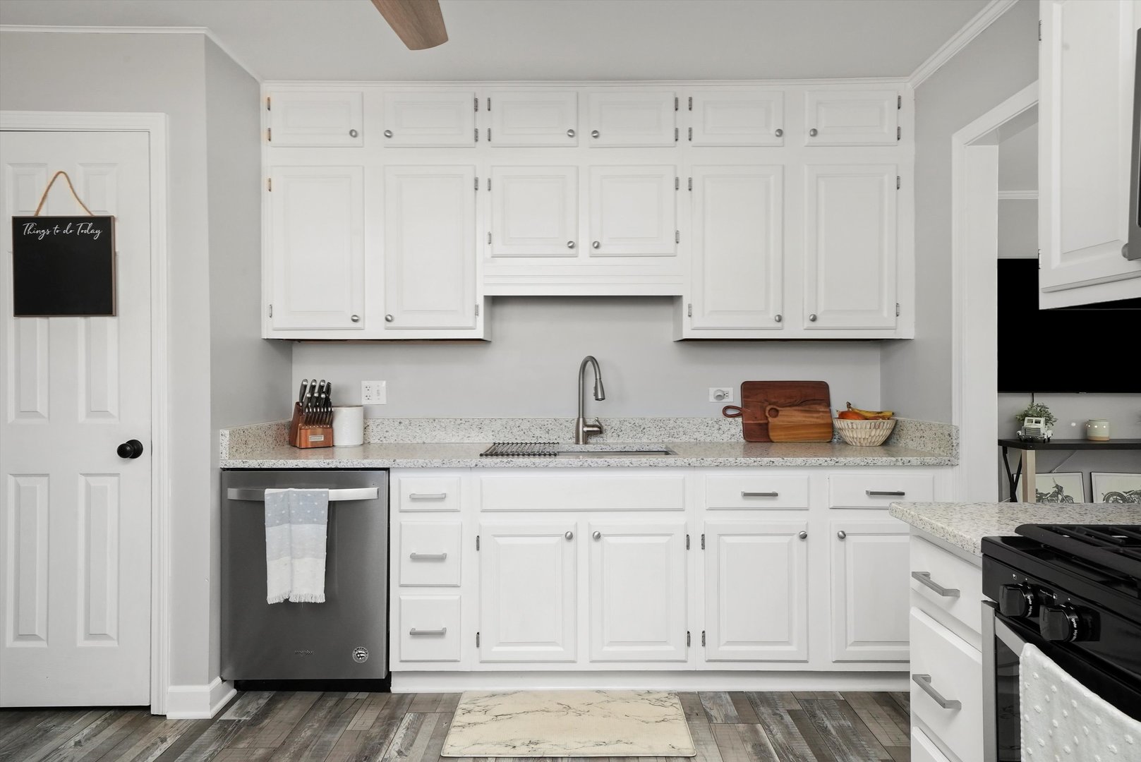 3908 Owl Drive Rolling Meadows, IL 60008 - Photo 8 of 36 a kitchen with white cabinets and sink