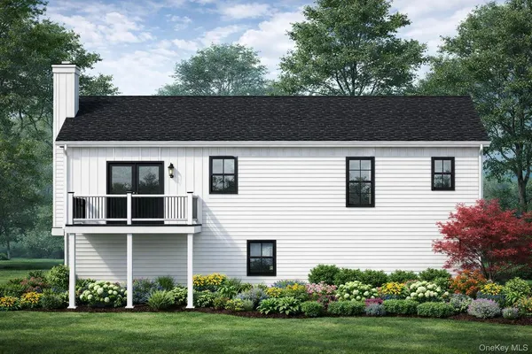 a house view with a garden space