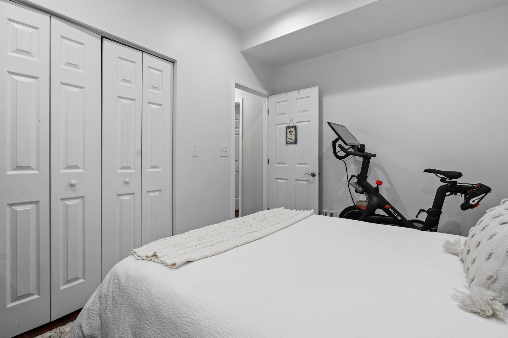3918 West Roscoe Street, Unit 2 Chicago, IL 60618 - Photo 14 of 19 a bedroom with a bed and a closet