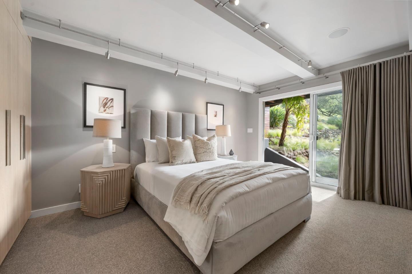 27201 Moody Road Los Altos Hills, CA 94022 - Photo 32 of 43 a bedroom with a large bed and a large window