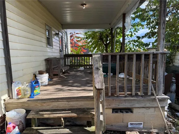 a brick building with a yard