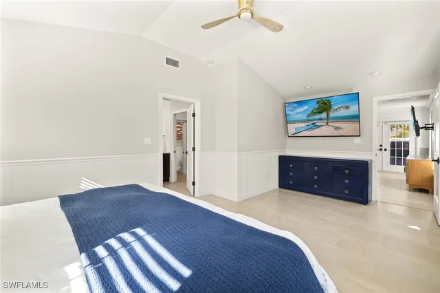 a view of a house with a backyard porch and sitting area
