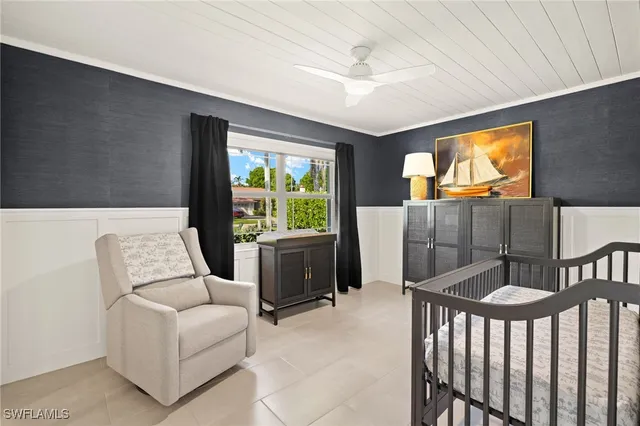 an aerial view of residential houses with outdoor space and swimming pool
