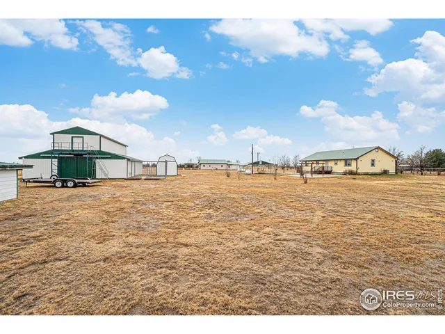 a view of an empty room with a fireplace