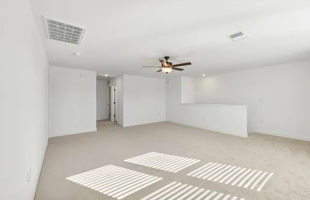 a bathroom with a sink a toilet a tub and a shower