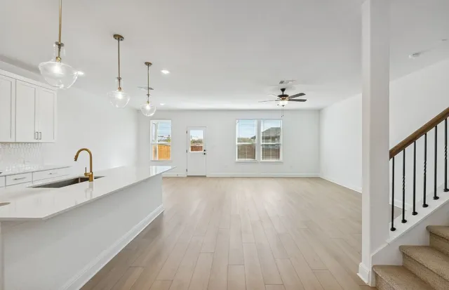 a picture of a bathroom with a sink and a mirror