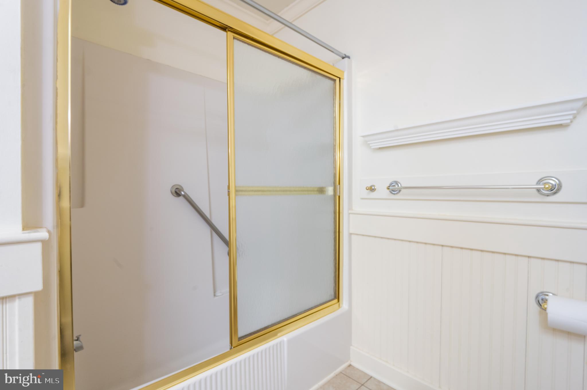 15729 Holly Grove Road Silver Spring, MD 20905 - Photo 60 of 83 a bathroom with a shower
