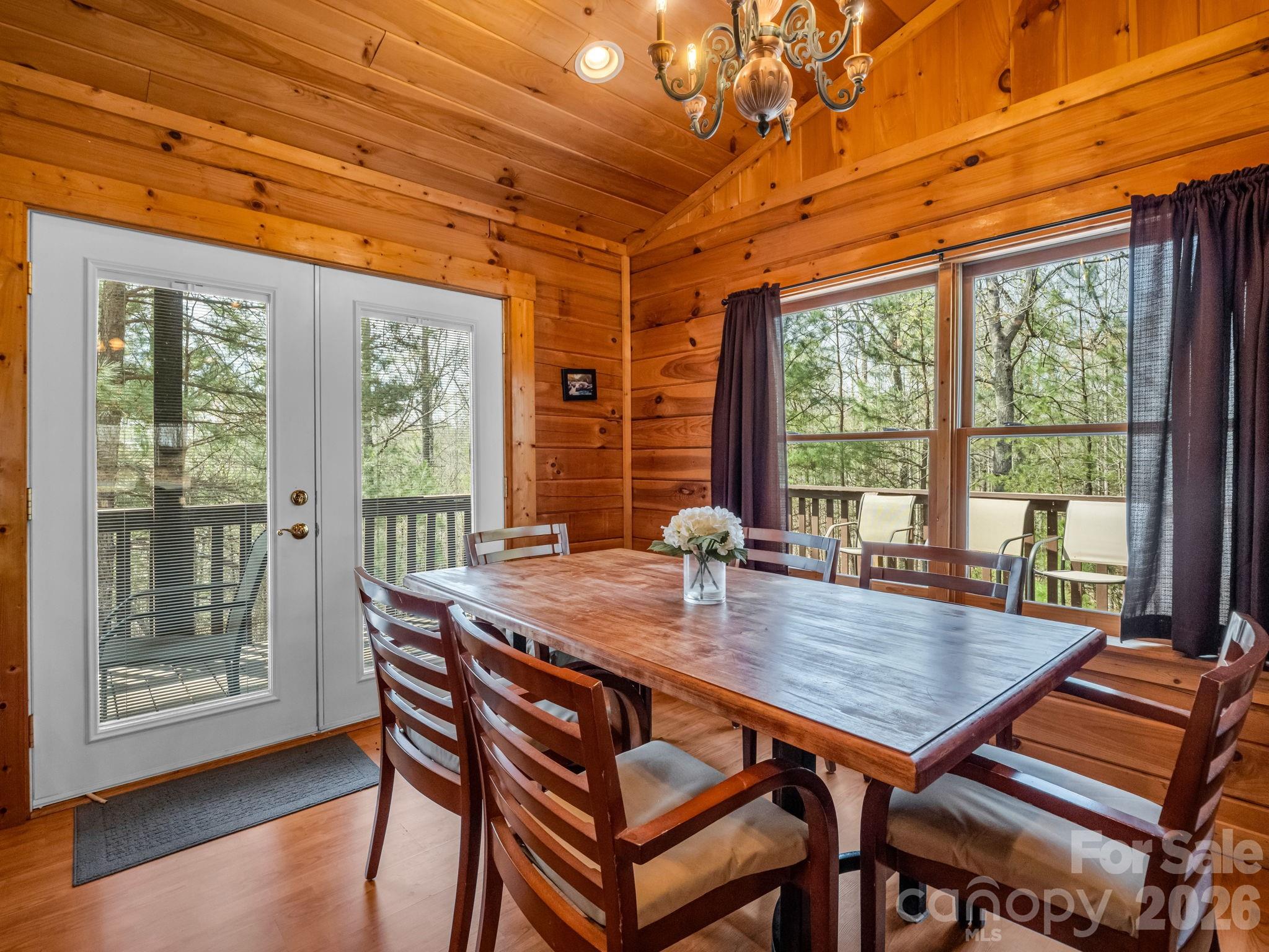 1050 Cross Ridge Drive Rutherfordton, NC 28139 - Photo 16 of 48 a view of a dining room with furniture window and outside view