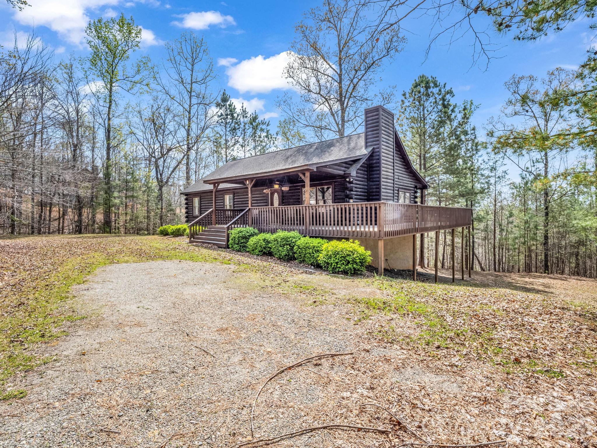 1050 Cross Ridge Drive Rutherfordton, NC 28139 - Photo 2 of 48 a front view of house with yard and trees around