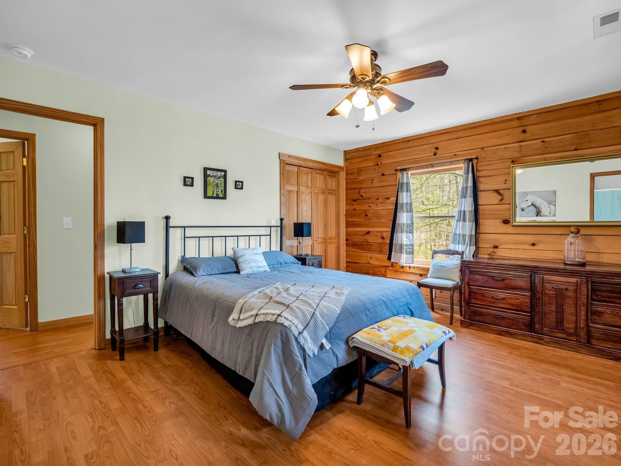 1050 Cross Ridge Drive Rutherfordton, NC 28139 - Photo 21 of 48 a bedroom with a bed and wooden floor