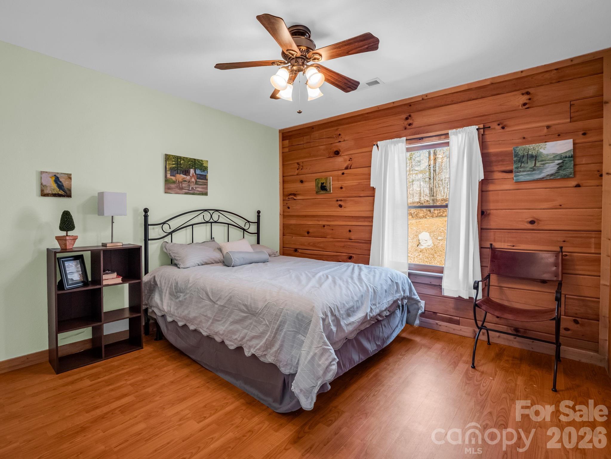 1050 Cross Ridge Drive Rutherfordton, NC 28139 - Photo 26 of 48 a bedroom with a bed and a bookshelf