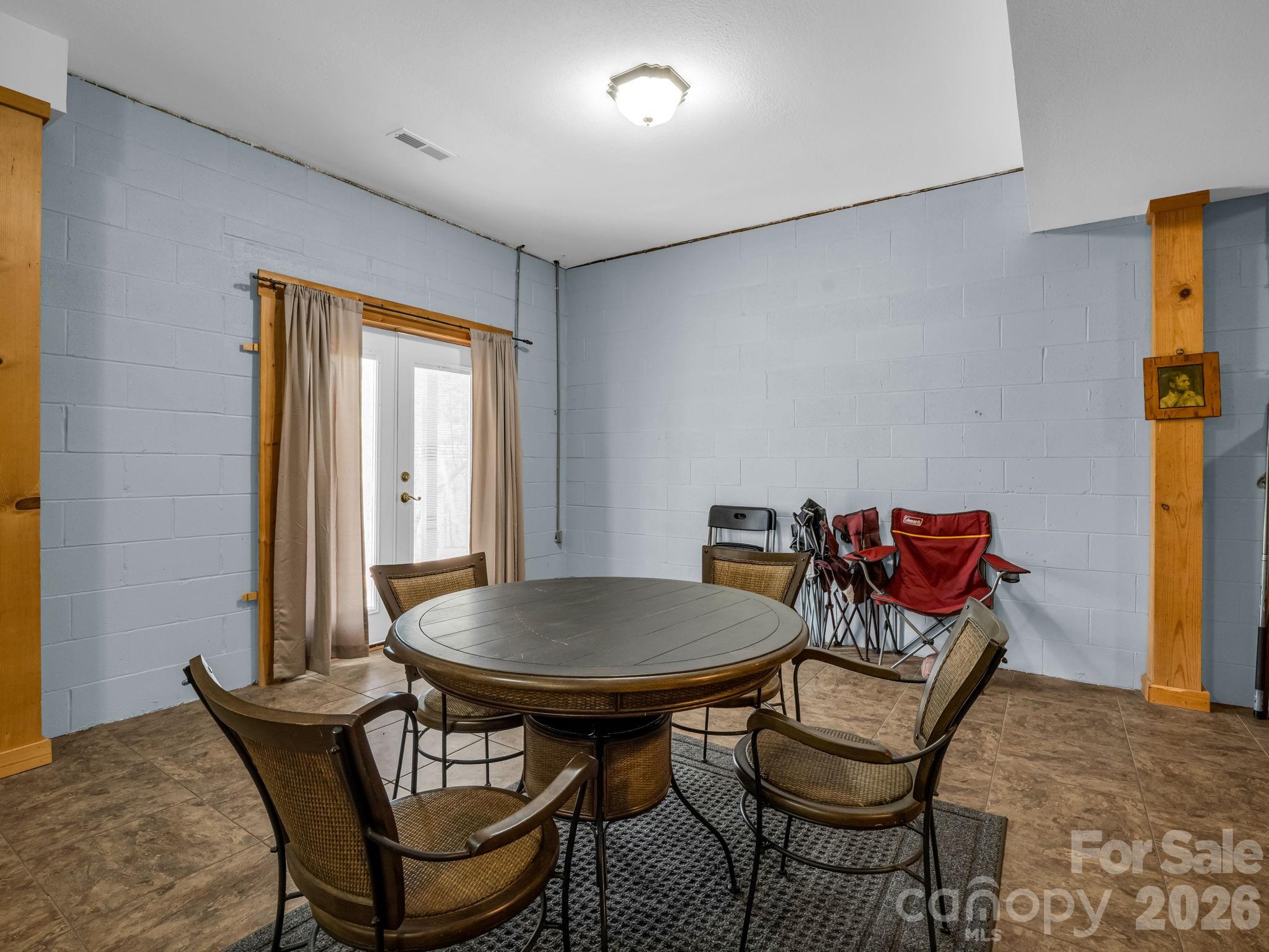 1050 Cross Ridge Drive Rutherfordton, NC 28139 - Photo 32 of 48 a view of a dining room with furniture and a window