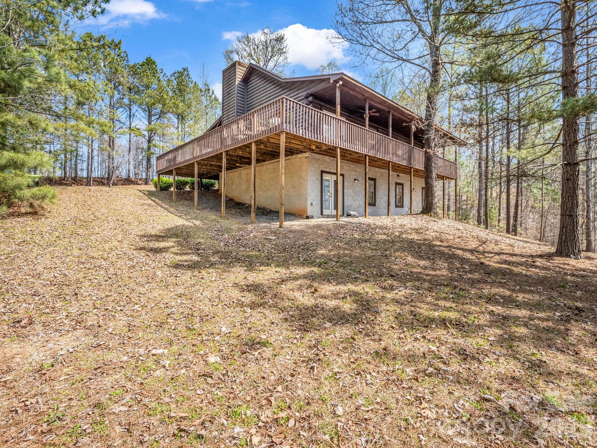 1050 Cross Ridge Drive Rutherfordton, NC 28139 - Photo 5 of 48 a front view of a house with a yard