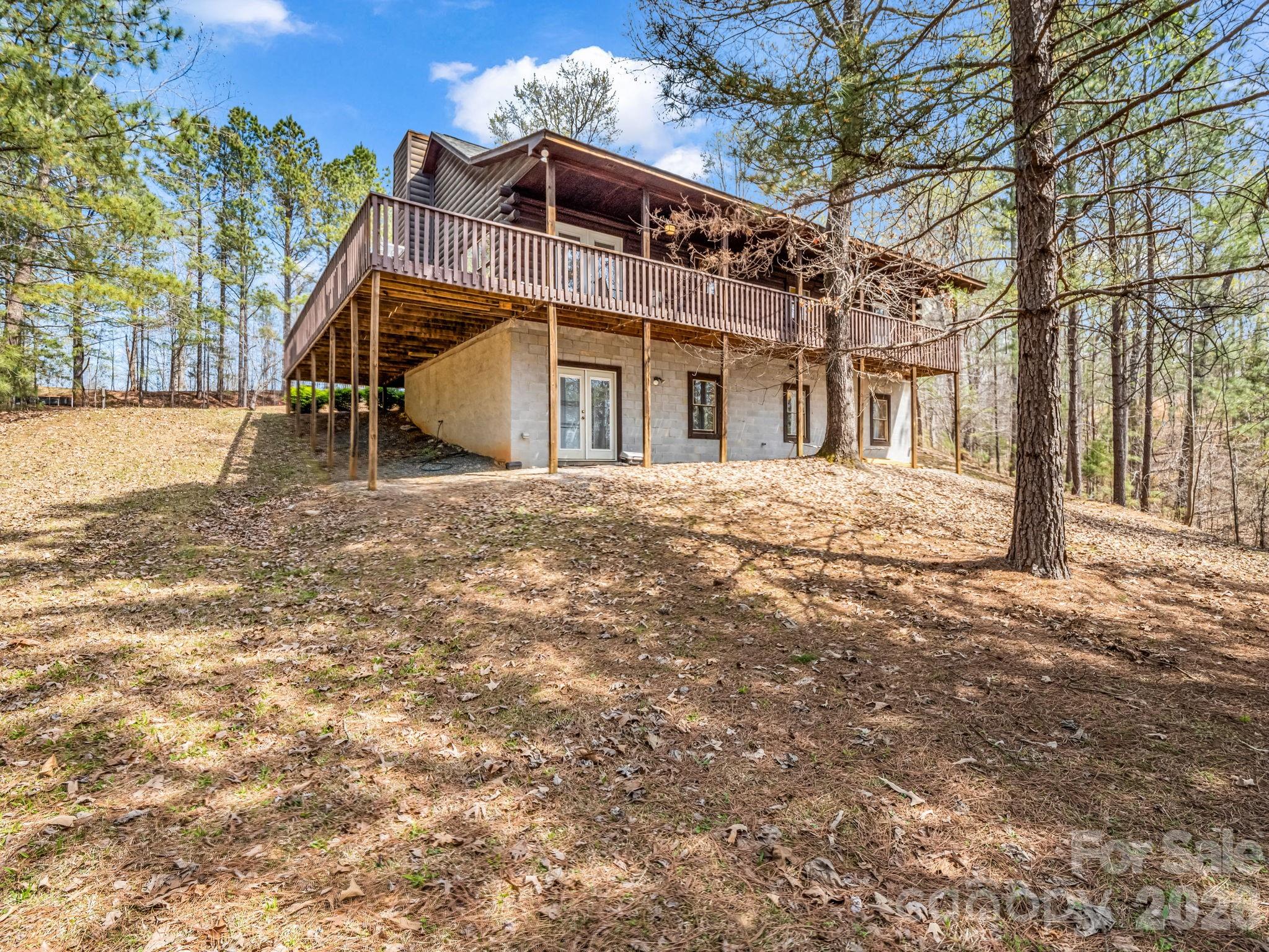 1050 Cross Ridge Drive Rutherfordton, NC 28139 - Photo 6 of 48 a front view of a house with a yard