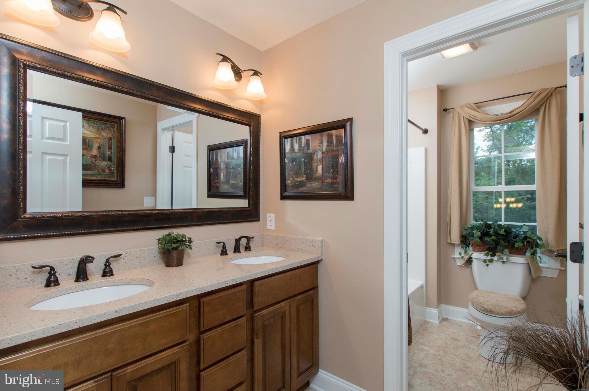2320 Pleasantville Road Fallston, MD 21047 - Photo 22 of 30 a bathroom with a sink and a mirror