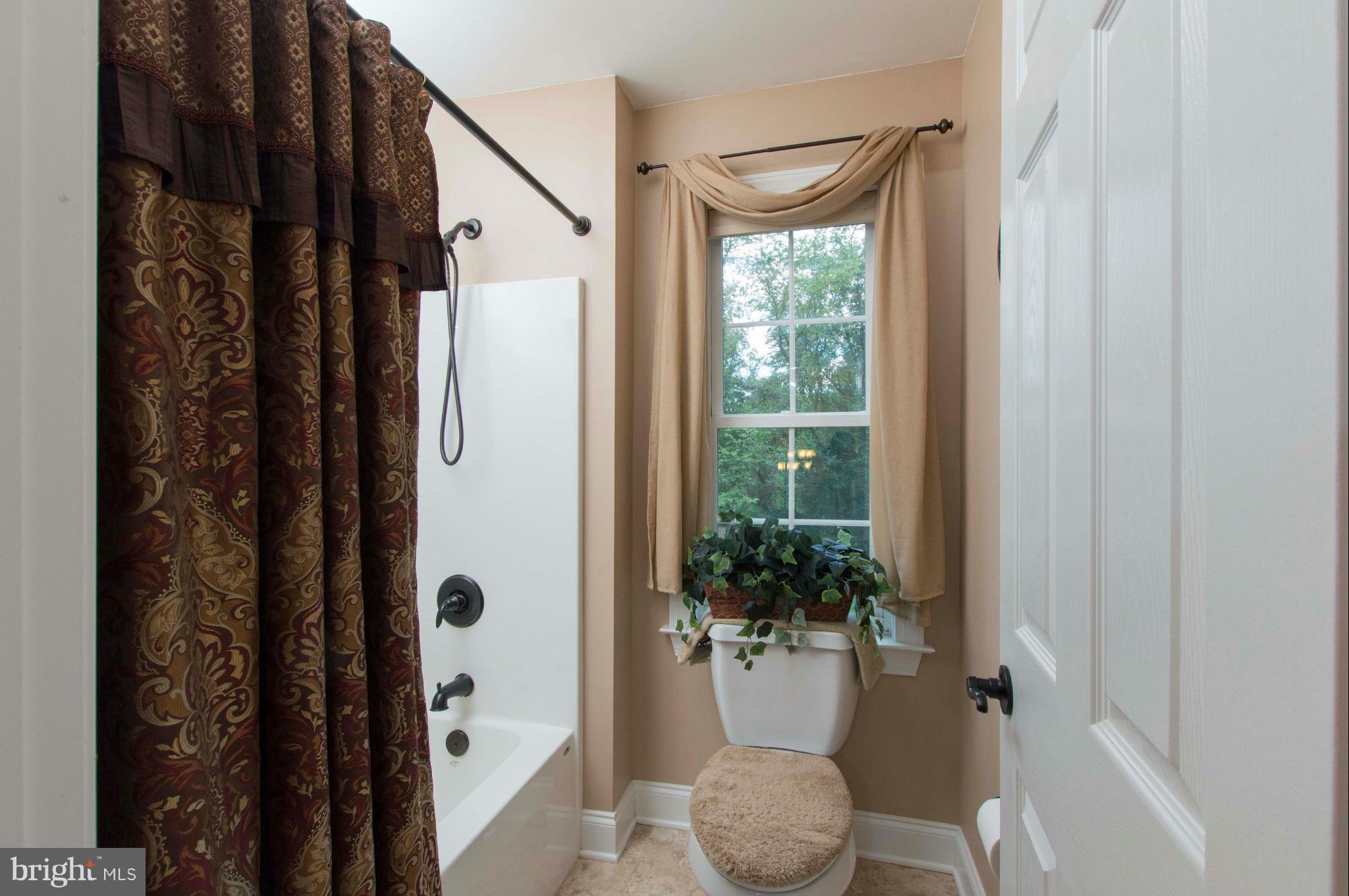 2320 Pleasantville Road Fallston, MD 21047 - Photo 23 of 30 a bathroom with a bathtub and shower