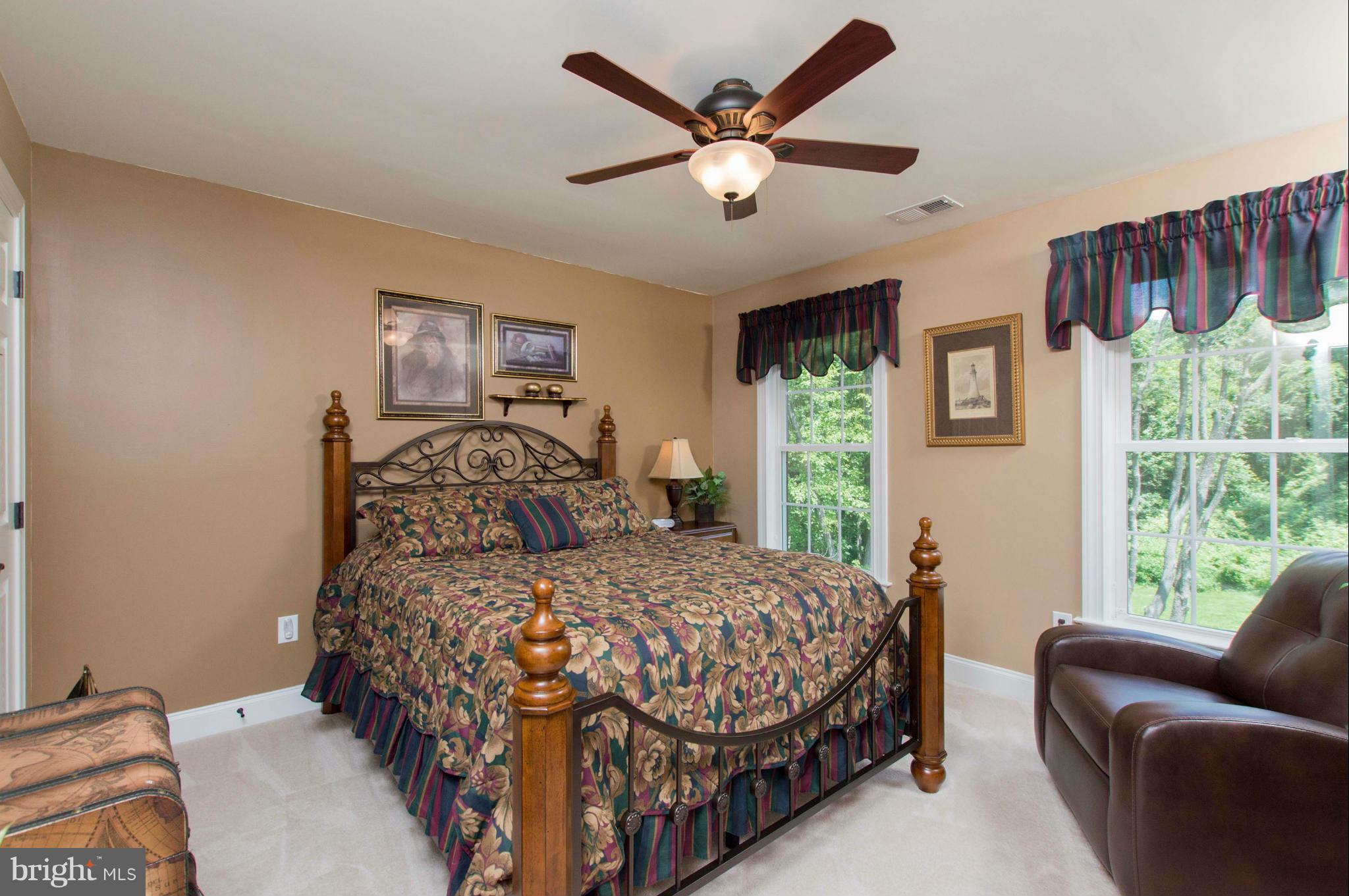 2320 Pleasantville Road Fallston, MD 21047 - Photo 25 of 30 a bedroom with a bed window and couch