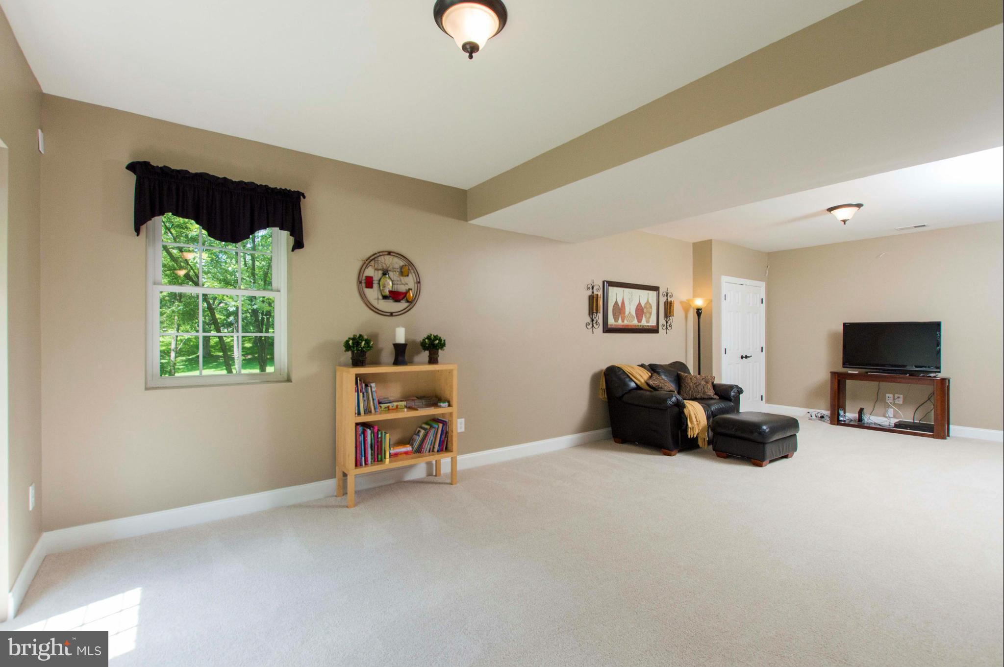 2320 Pleasantville Road Fallston, MD 21047 - Photo 29 of 30 a living room with furniture and a flat screen tv