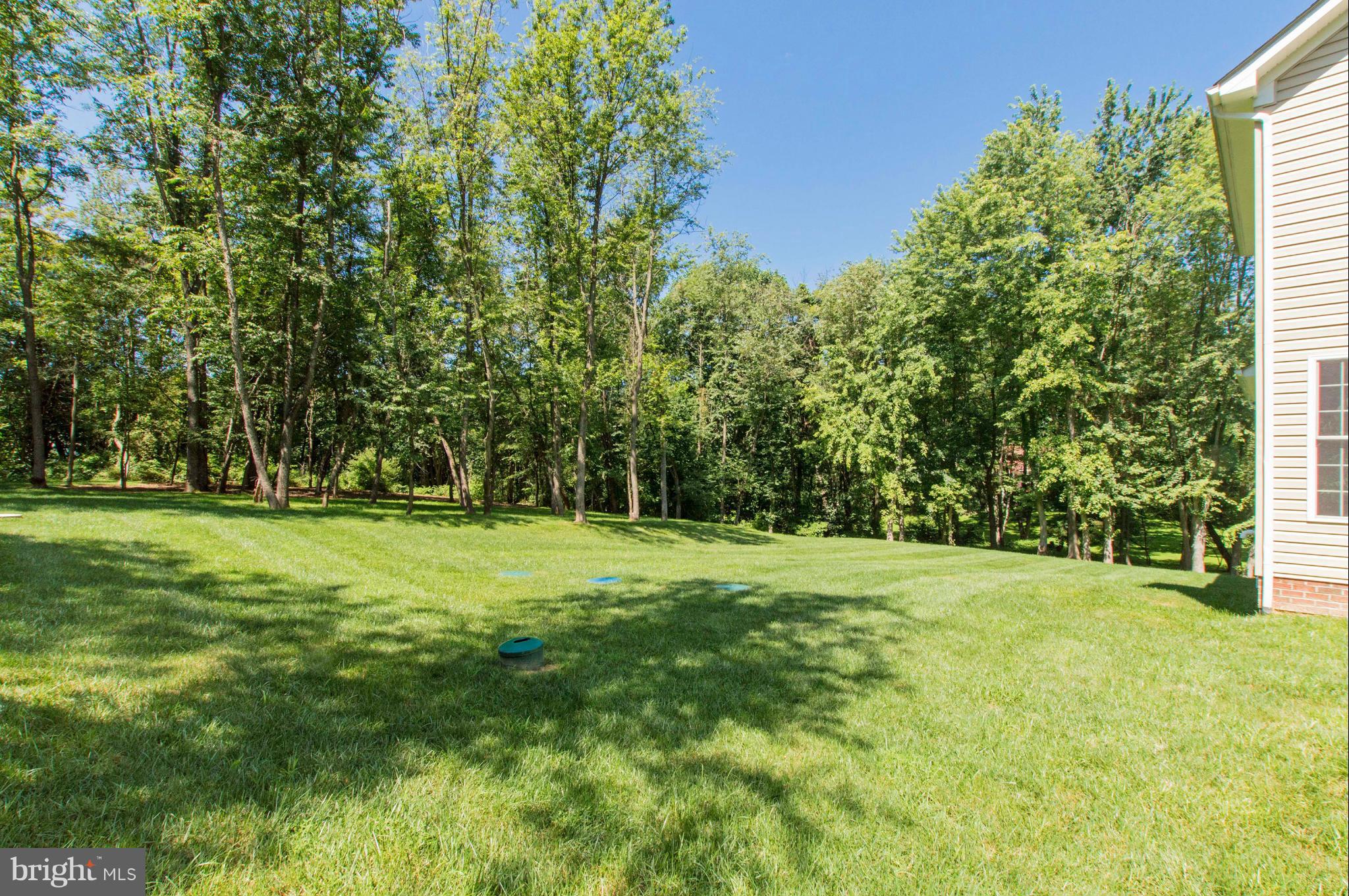 2320 Pleasantville Road Fallston, MD 21047 - Photo 30 of 30 a view of a grassy field with trees