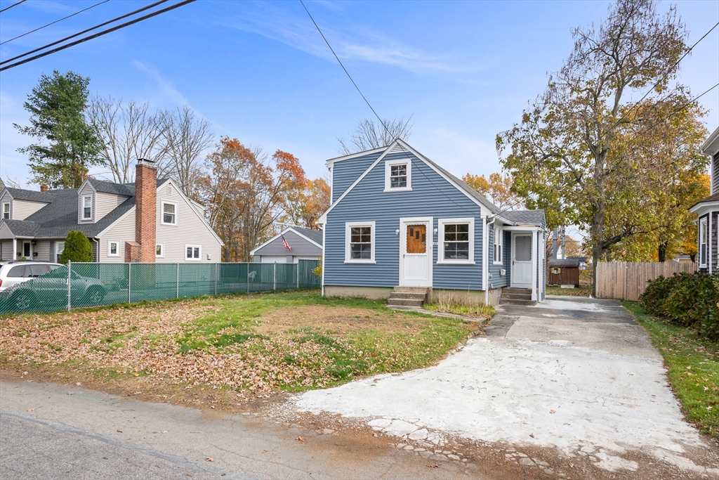 63 Hope Street Attleboro, MA 02703 - Photo 26 of 27 a front view of a house with a yard