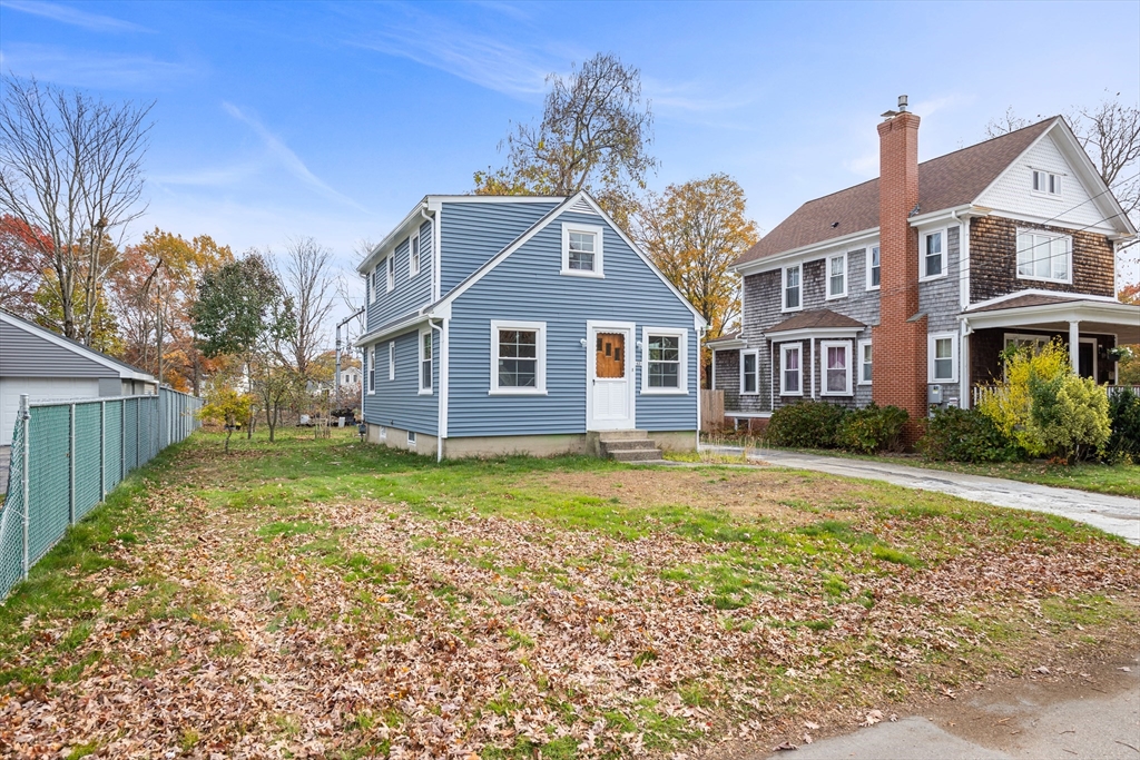 63 Hope Street Attleboro, MA 02703 - Photo 27 of 27 a front view of a house with garden