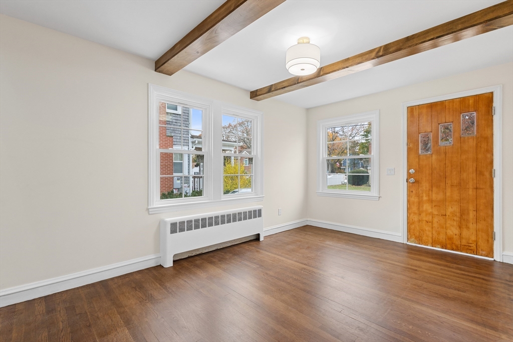 63 Hope Street Attleboro, MA 02703 - Photo 6 of 27 an empty room with windows