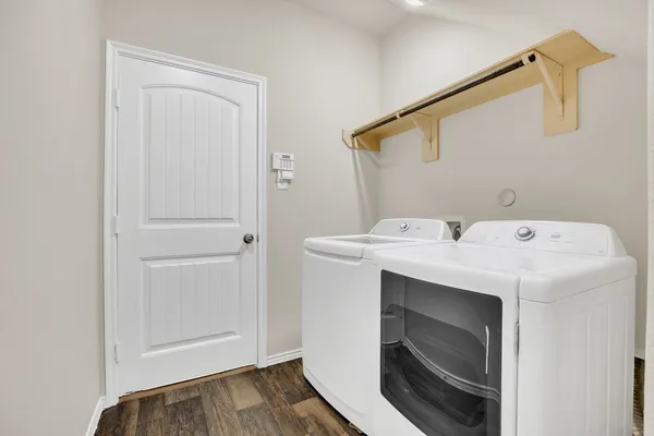 a utility room with dryer and washer