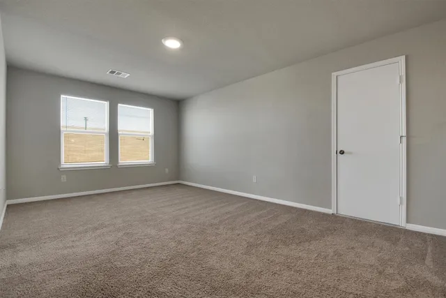 a bathroom with a double vanity sink and mirror
