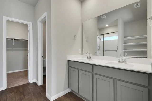 a view of a bathroom from the hallway