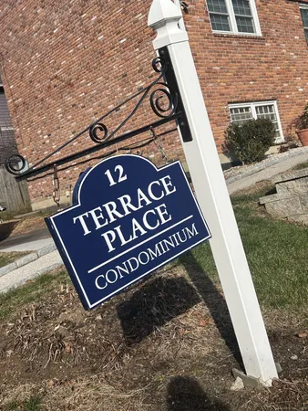a city street lined with buildings and cars