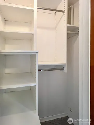 a view of an empty walk in closet