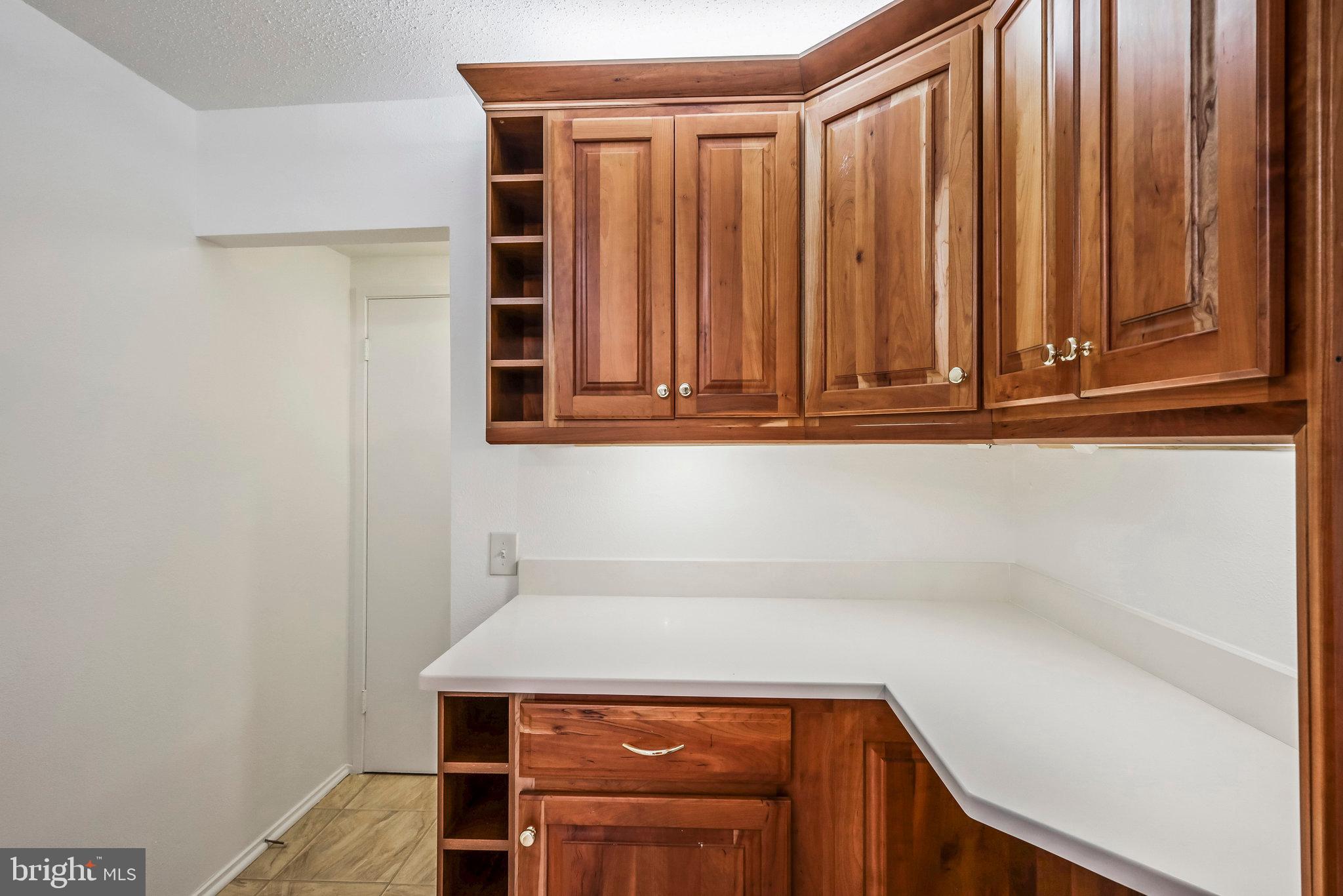 6101 Edsall Road, Unit 712 Alexandria, VA 22304 - Photo 13 of 53 a view of a storage and utility room with washer and dryer