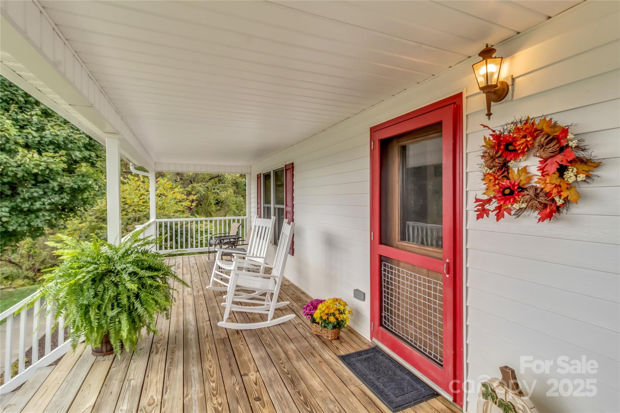 580 River Point Road Canton, NC 28716 - Photo 12 of 46 a very nice looking room with a large window and wooden floor