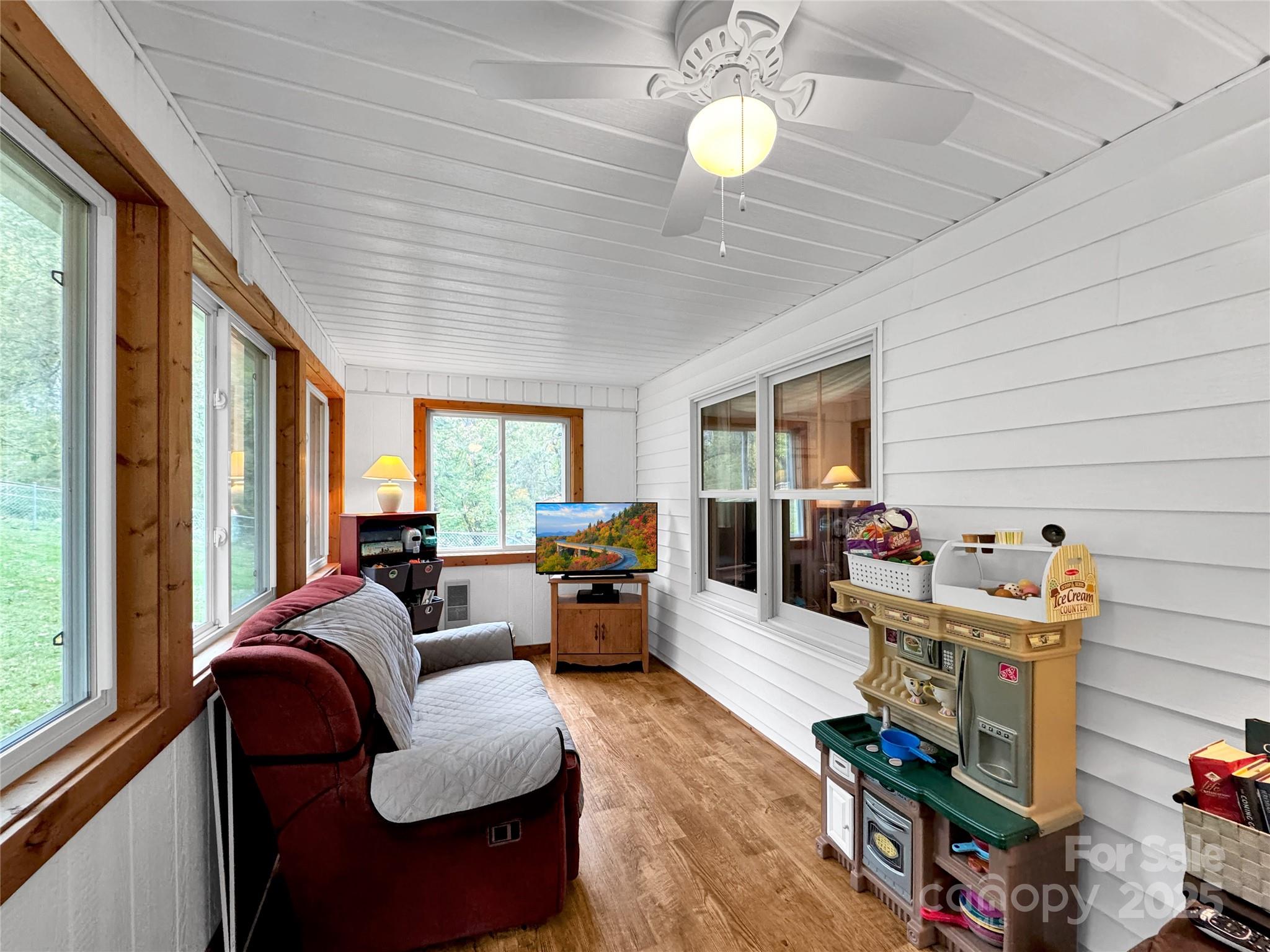580 River Point Road Canton, NC 28716 - Photo 24 of 46 a living room with furniture and a large window