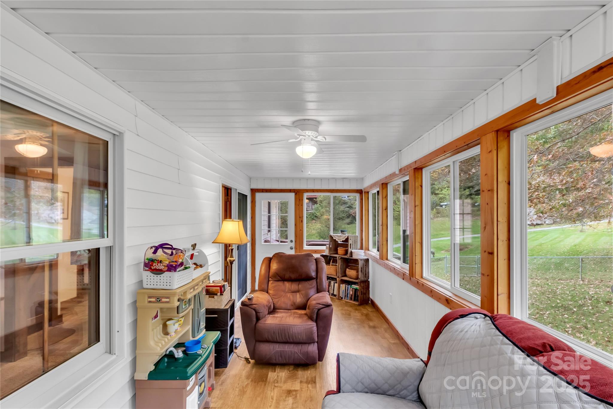 580 River Point Road Canton, NC 28716 - Photo 25 of 46 a living room with furniture and a large window