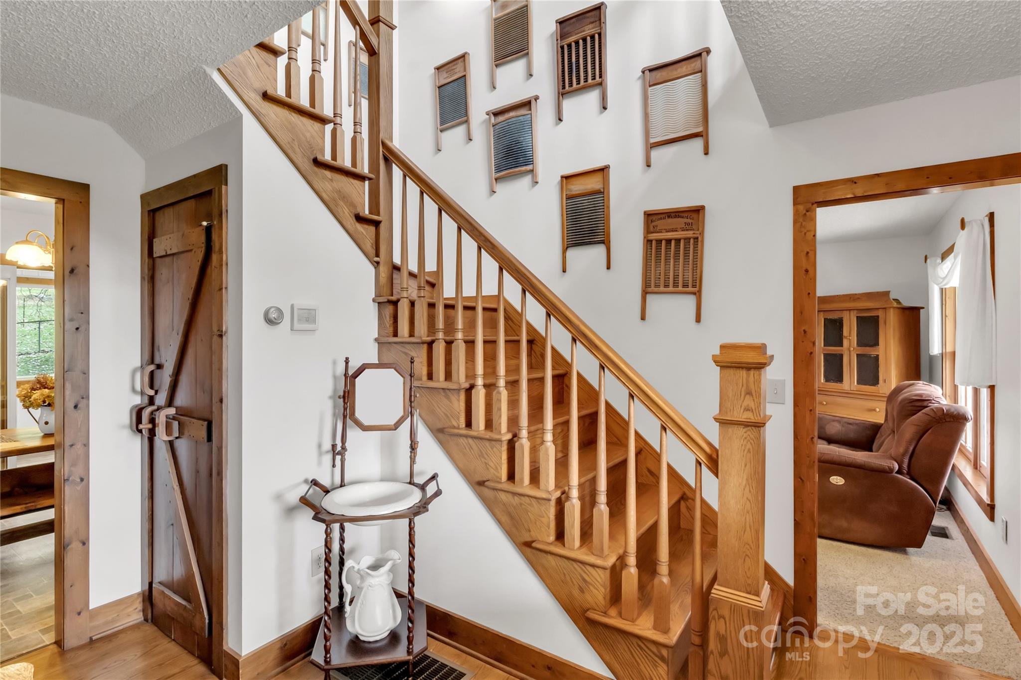 580 River Point Road Canton, NC 28716 - Photo 29 of 46 a view of entryway and hall with wooden floor