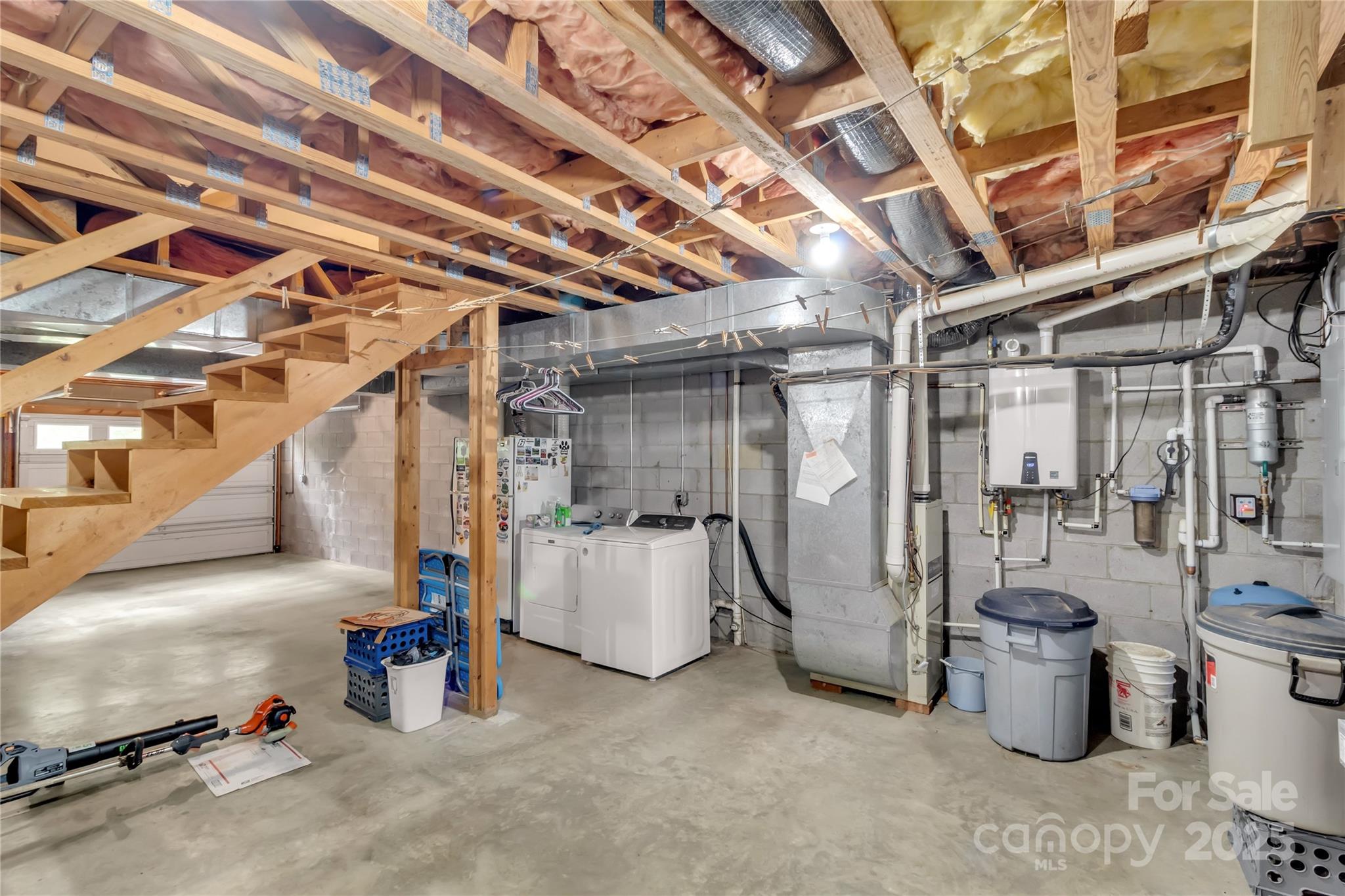 580 River Point Road Canton, NC 28716 - Photo 41 of 46 a view of a storage room with shelves