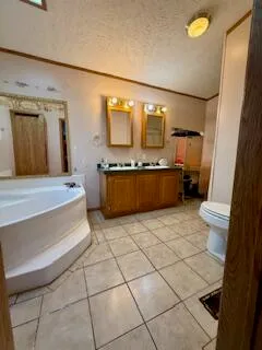 a living room with a couch and a stove top oven