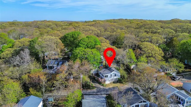 a view of roof deck with large trees