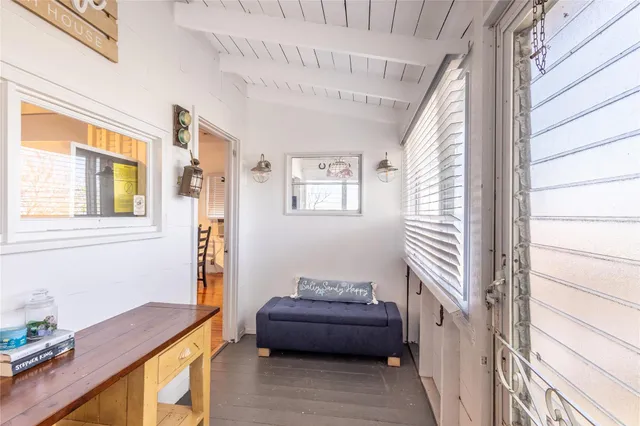 a room with furniture and a window