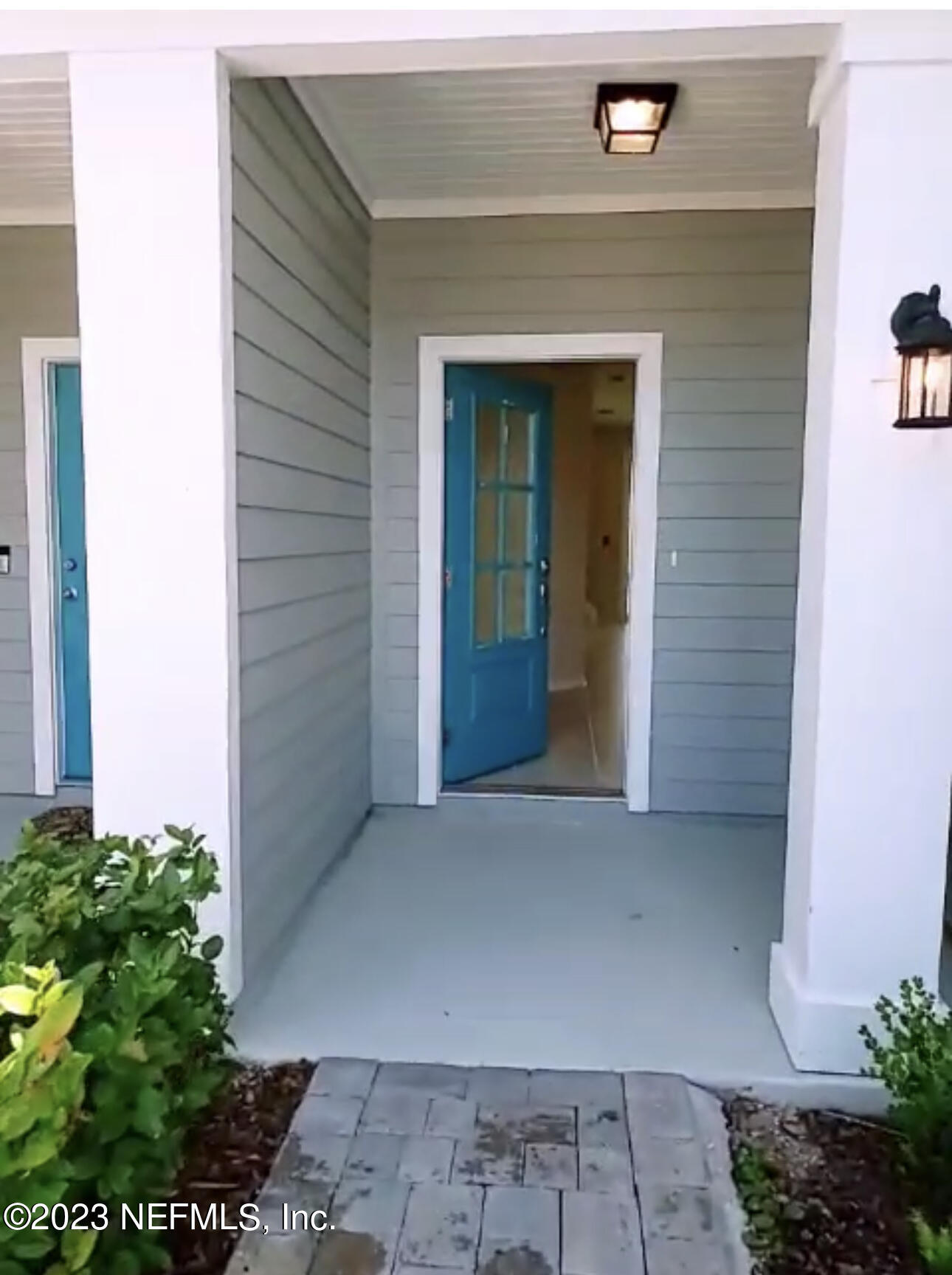 433 Pine Bluff Drive St. Augustine, FL 32092 - Photo 3 of 23 a front view of a house with a yard