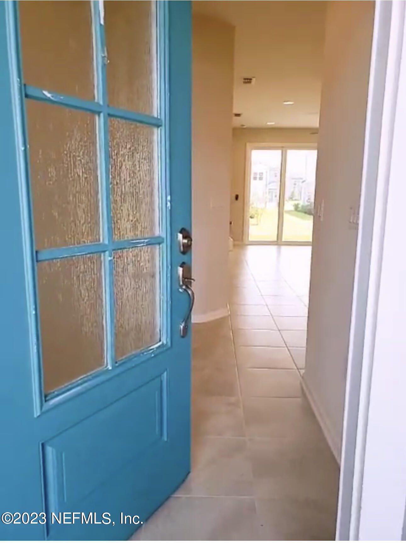 433 Pine Bluff Drive St. Augustine, FL 32092 - Photo 4 of 23 view of living room with a window