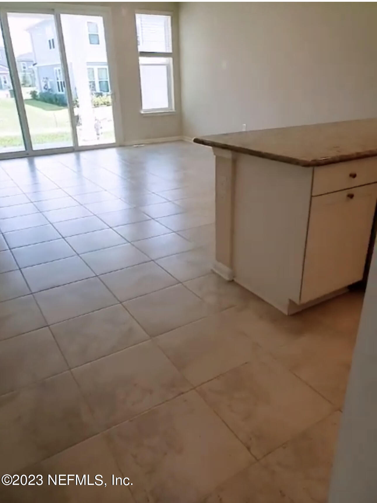 433 Pine Bluff Drive St. Augustine, FL 32092 - Photo 8 of 23 a view of an empty room with a window